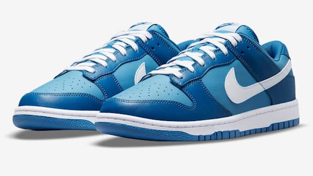 Two-toned blue Nike Dunk shoes.